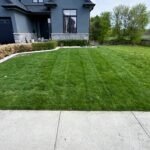 SG Mowing providing residential lawn maintenance in Ilderton