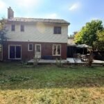 Overgrown yard in London, Ontario After professional lawn care by SG Mowing