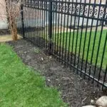 Professional mulch spreading in London Ontario landscaping service