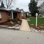Mulch installation service in London Ontario residential garden beds